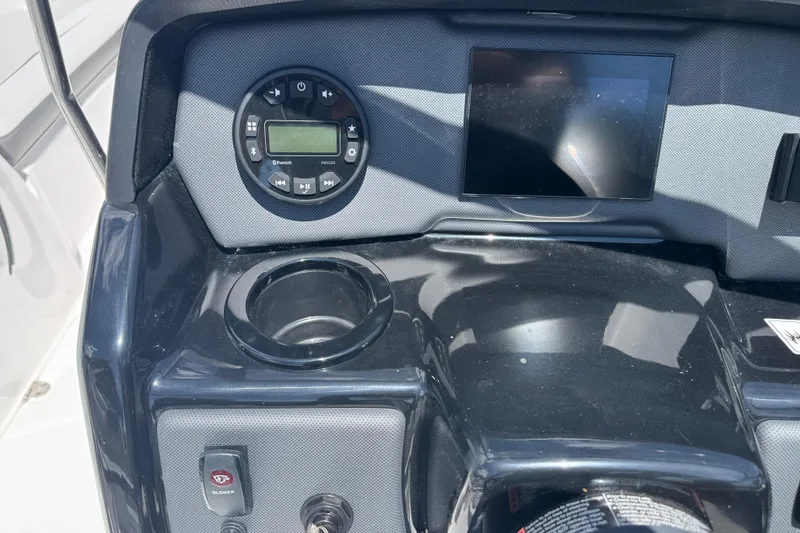 Slide: The Image of Dashboard of 2025 Yamaha Boats SX190 with control panel and display screen. - 18