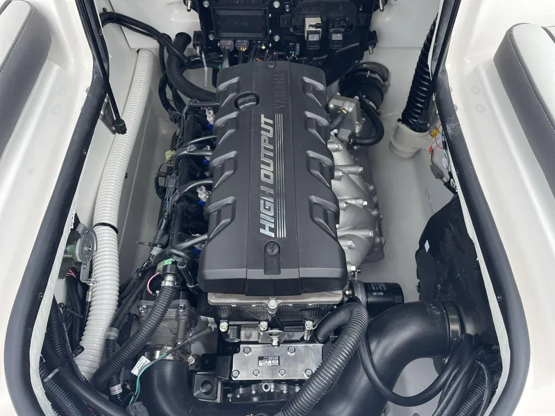 Slide: The Image of Engine compartment of 2025 Yamaha Boats SX190, featuring high output engine components. - 31
