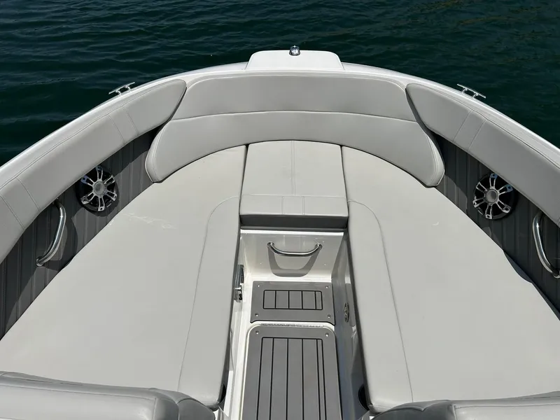 Slide: The Image of Bow seating area of 2020 Sea Ray SPX 230 boat with gray upholstery. - 6