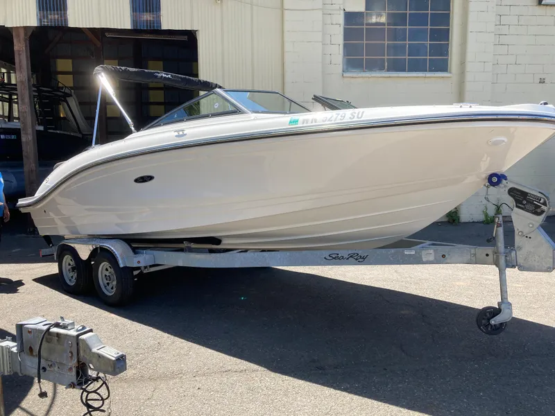 Slide: The Image of 2021 Sea Ray SPX 210 OB boat on trailer, parked outdoors. - 3