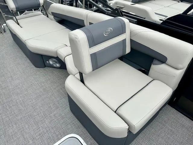 Slide: The Image of 2025 Barletta C24M boat interior with luxurious gray and white seating. - 10