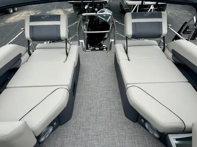 Slide: The Image of 2025 Barletta C24M boat interior with luxurious seating and modern design. - 12