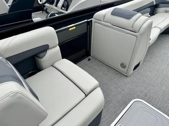 Slide: The Image of 2025 Barletta C24M boat interior with luxurious seating and modern design. - 8