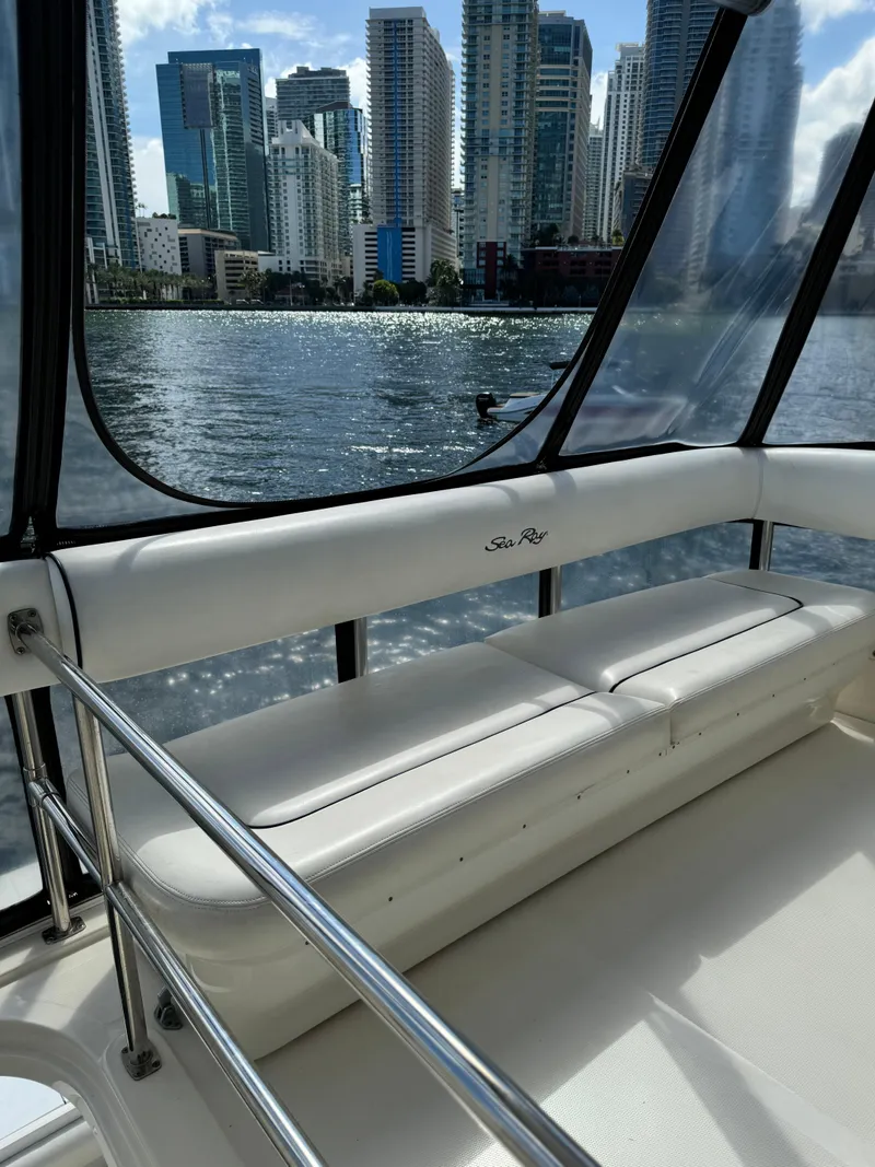 Slide: The Image of 2005 Sea Ray 58 Sedan Bridge interior with city skyline view. - 22