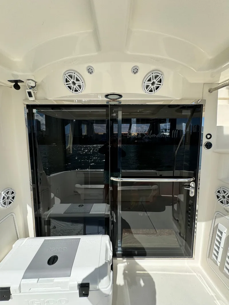 Slide: The Image of 2005 Sea Ray 58 Sedan Bridge yacht with sliding glass doors and outdoor speakers. - 31