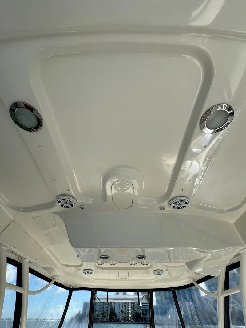 Slide: The Image of Ceiling view of 2005 Sea Ray 58 Sedan Bridge yacht interior with speakers and lights. - 34