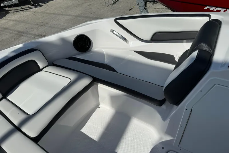 Slide: The Image of 2025 Yamaha Boats SX195 interior seating with sleek black and white design. - 24
