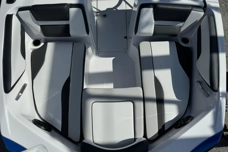Slide: The Image of 2025 Yamaha Boats SX195 interior seating with sleek, modern design and comfortable upholstery. - 26