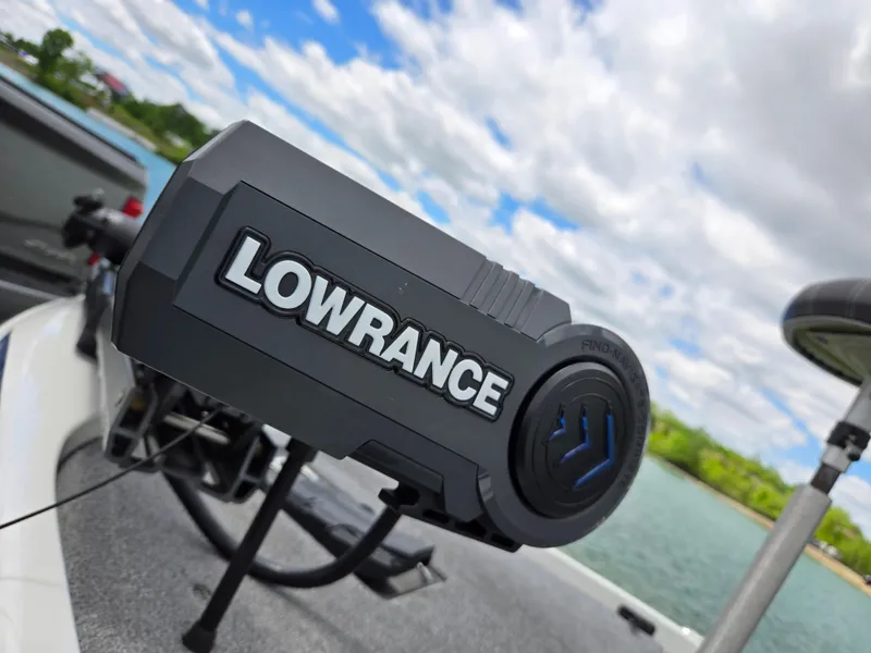 Slide: The Image of Lowrance device on 2015 Skeeter FX 20 boat, with scenic lake background. - 8