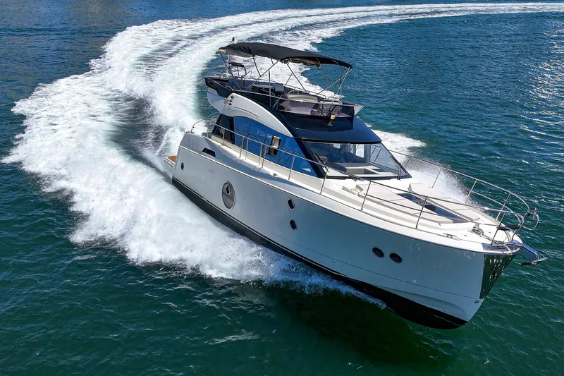 Slide: The Image of 2017 Beneteau Monte Carlo 5 MC5 yacht cruising on open water. - 15