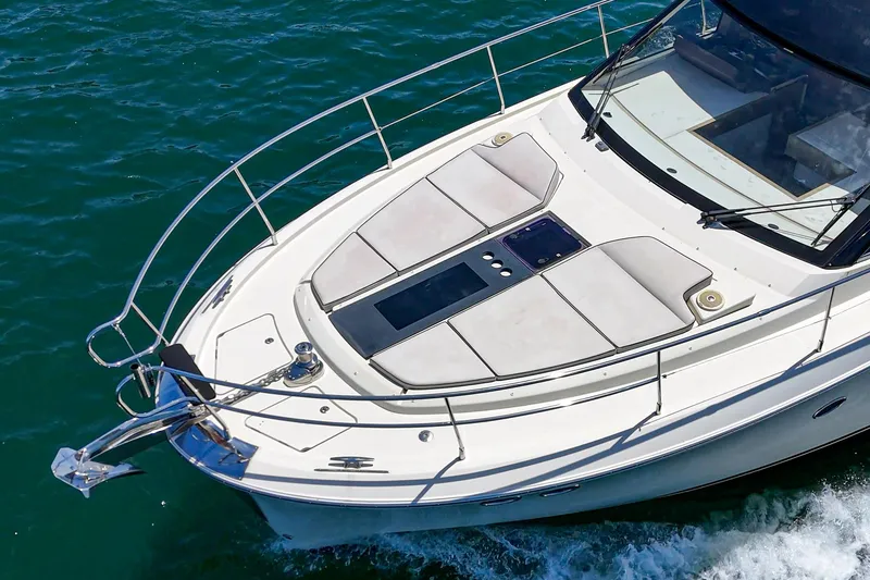 Slide: The Image of 2017 Beneteau Monte Carlo 5 MC5 yacht cruising on clear blue water. - 19