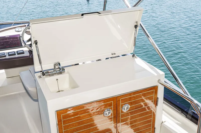 Slide: The Image of 2017 Beneteau Monte Carlo 5 MC5 yacht sink and storage area on deck. - 25