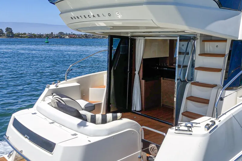 Slide: The Image of 2017 Beneteau Monte Carlo 5 MC5 yacht with open deck and luxurious interior. - 27