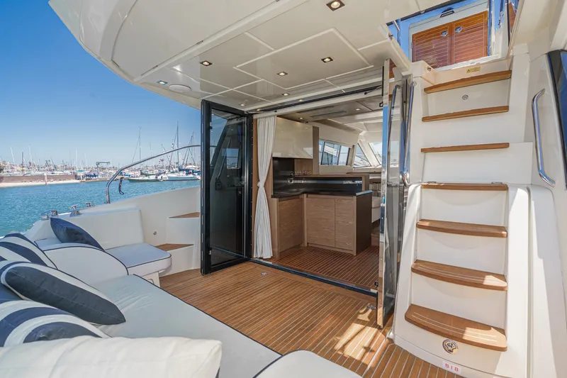 Slide: The Image of 2017 Beneteau Monte Carlo 5 MC5 yacht interior with open deck and staircase. - 28