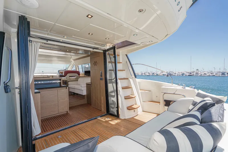 Slide: The Image of Luxurious 2017 Beneteau Monte Carlo 5 MC5 yacht interior with open deck and sea view. - 30