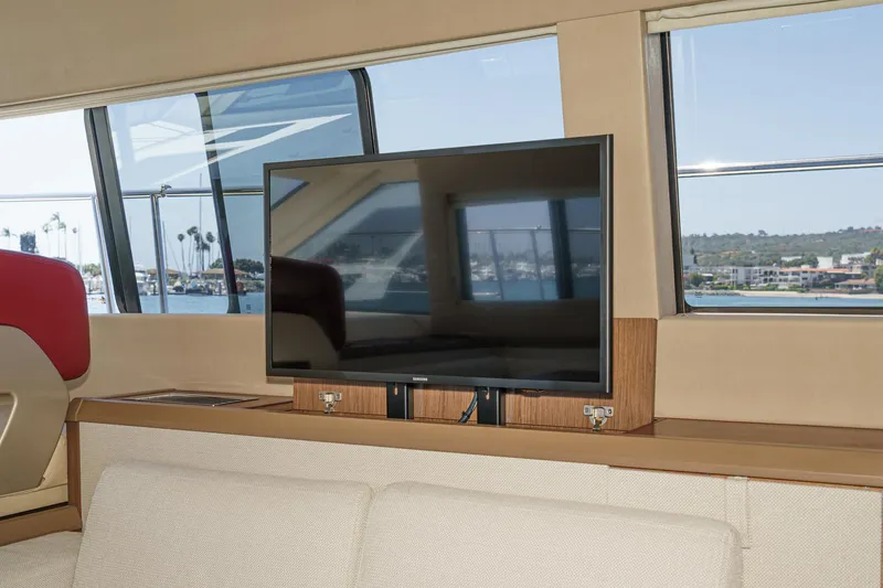 Slide: The Image of Interior of 2017 Beneteau Monte Carlo 5 MC5 yacht with TV and scenic window view. - 36
