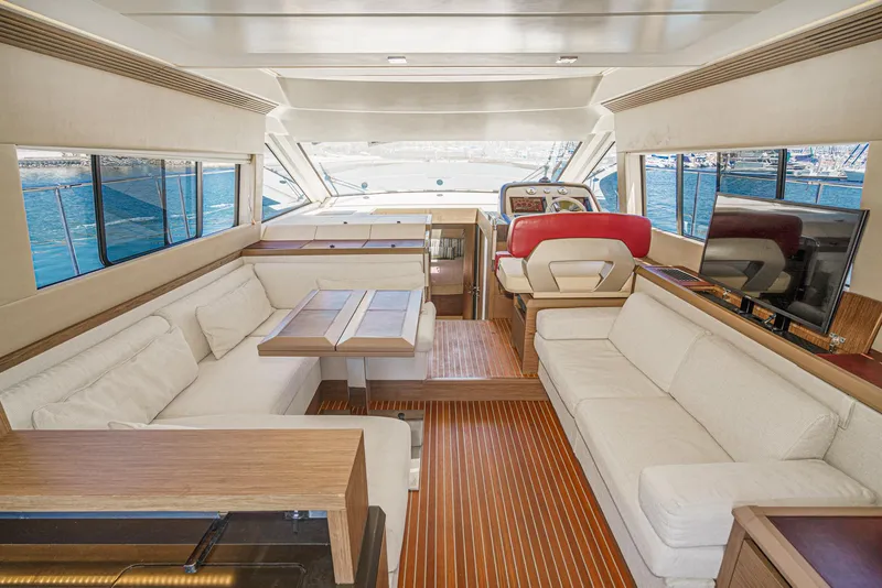 Slide: The Image of Luxurious interior of 2017 Beneteau Monte Carlo 5 MC5 yacht with elegant seating and helm. - 38