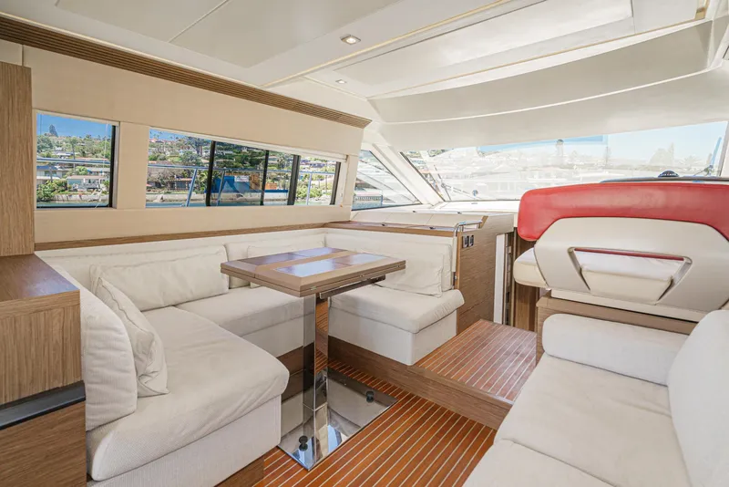 Slide: The Image of Luxurious interior of 2017 Beneteau Monte Carlo 5 MC5 yacht with elegant seating and dining area. - 39