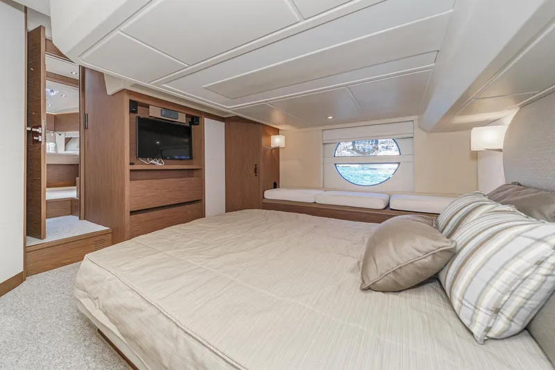 Slide: The Image of Luxurious interior of 2017 Beneteau Monte Carlo 5 MC5 yacht cabin with modern amenities. - 47