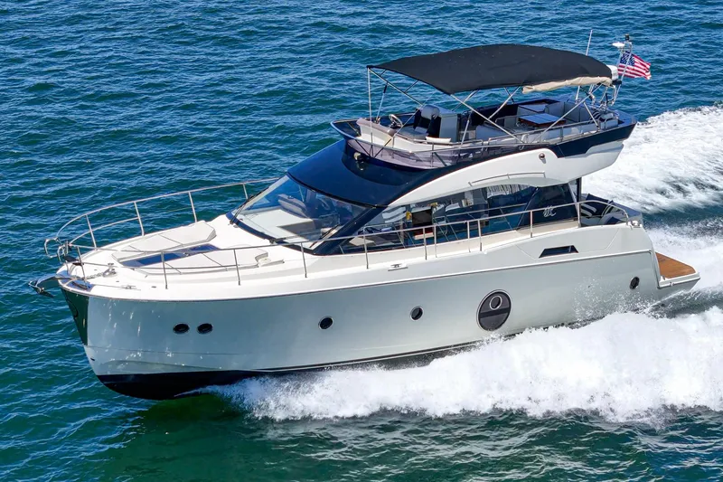 Slide: The Image of 2017 Beneteau Monte Carlo 5 MC5 yacht cruising on open water. - 7