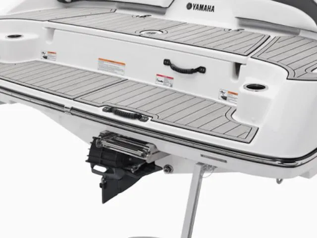 Slide: The Image of 2025 Yamaha Boats SX195 swim platform with sleek design and integrated ladder. - 17