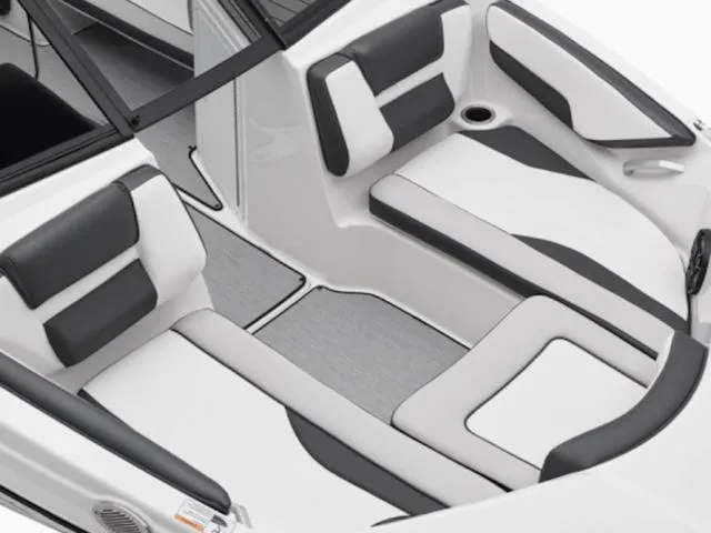 Slide: The Image of 2025 Yamaha Boats SX195 interior with sleek white and black seating design. - 18