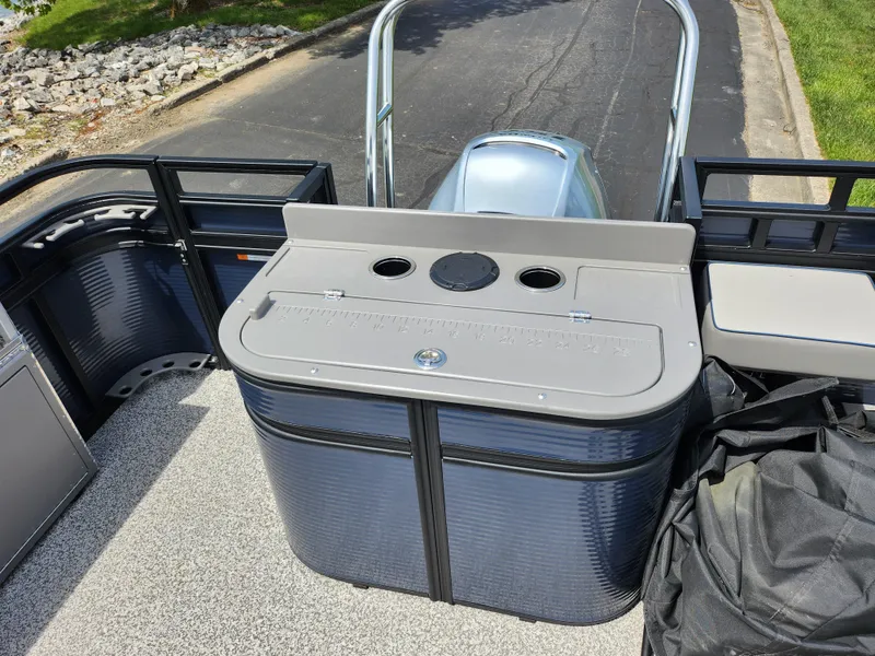 Slide: The Image of 2023 Qwest 8522 Pro Family Fish boat interior with fishing station and storage. - 21