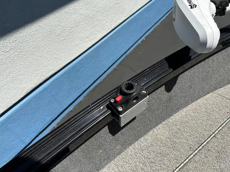 Slide: The Image of Alumacraft Classic 165 boat detail, 2020 model, featuring a mounted accessory on the rail. - 25