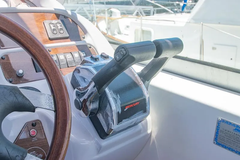 Slide: The Image of 2007 Chaparral Signature 310 boat controls with Mercury throttle levers. - 39