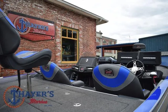 Slide: The Image of 2021 Ranger Z521L boat at Thayer's Marine, featuring advanced navigation equipment. - 13