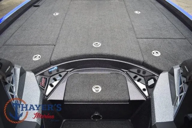 Slide: The Image of 2021 Ranger Z521L boat deck with storage compartments, Thayer's Marine logo visible. - 25