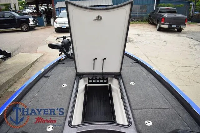 Slide: The Image of 2021 Ranger Z521L boat with open storage compartment at Thayer's Marine. - 28