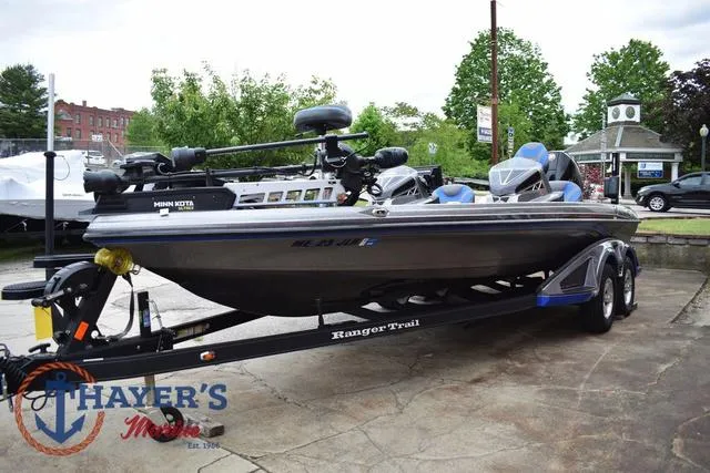Slide: The Image of 2021 Ranger Z521L fishing boat on trailer at Thayer's Marine dealership. - 6