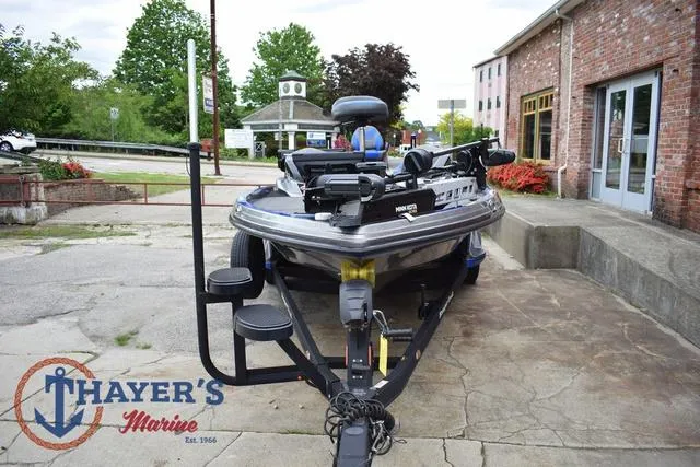 Slide: The Image of 2021 Ranger Z521L boat on trailer at Thayer's Marine dealership. - 7
