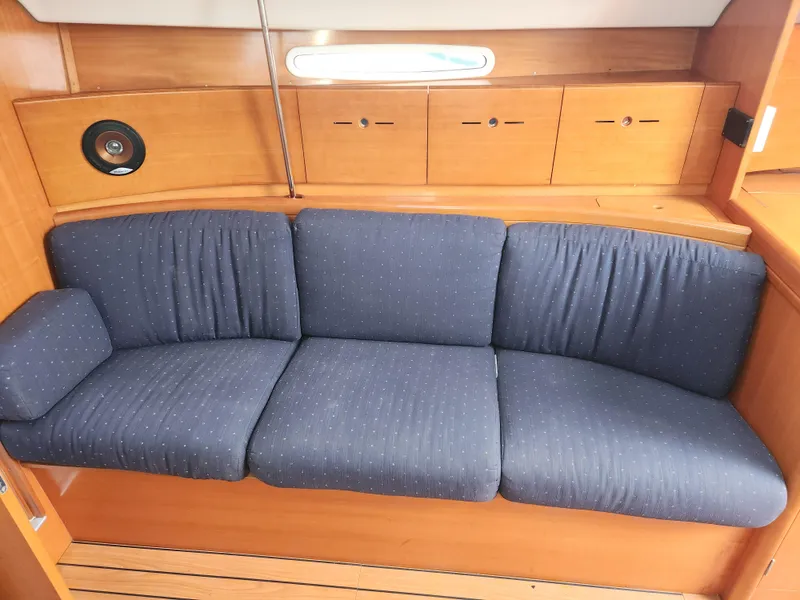 Slide: The Image of Blue cushioned seating in 2003 Beneteau First 40.7 yacht interior. - 10