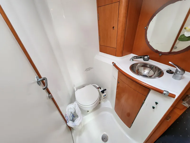 Slide: The Image of Bathroom interior of 2003 Beneteau First 40.7 yacht with sink and toilet. - 15