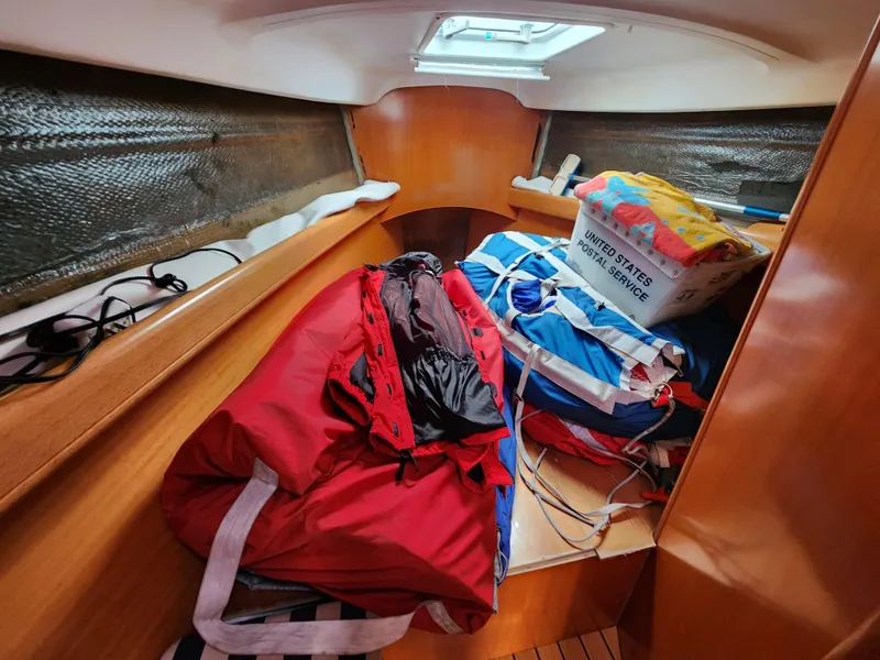 Slide: The Image of Interior cabin of 2003 Beneteau First 40.7 with bags and storage items. - 17