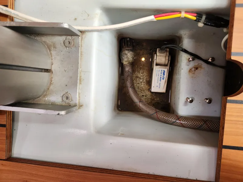 Slide: The Image of Bilge area of 2003 Beneteau First 40.7 sailboat, showing pump and wiring. - 26