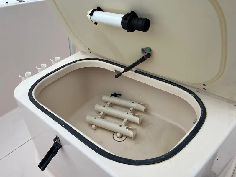Slide: The Image of Open storage compartment on a 1999 Grady-White 222 boat. - 21