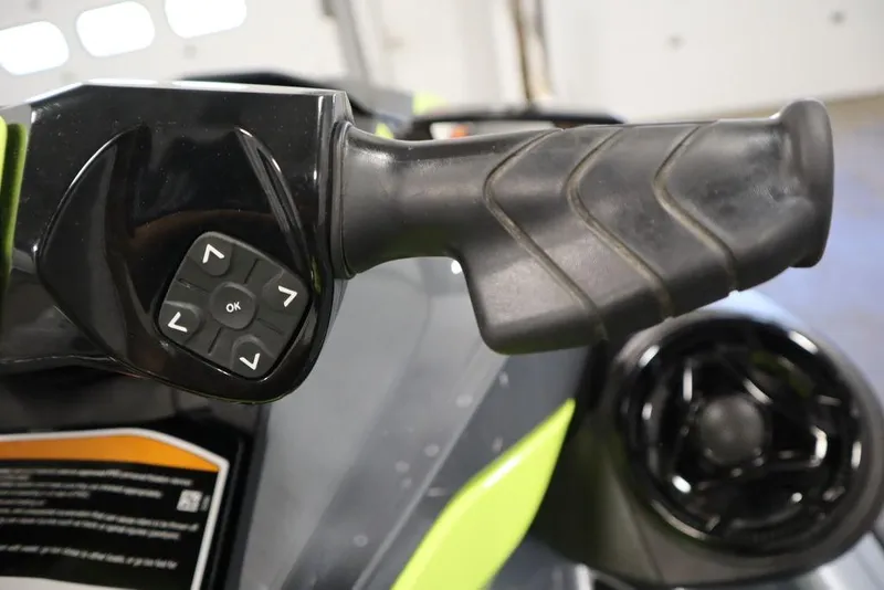 Slide: The Image of Close-up of 2022 Sea-Doo GTI SE 170 SS handlebar with control buttons. - 12