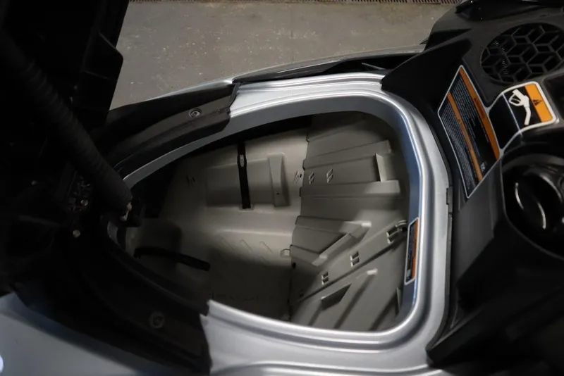 Slide: The Image of 2022 Sea-Doo GTI SE 170 SS storage compartment, open view, showcasing interior design. - 17