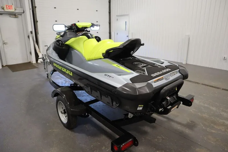 Slide: The Image of 2022 Sea-Doo GTI SE 170 SS jet ski on trailer in garage. - 20