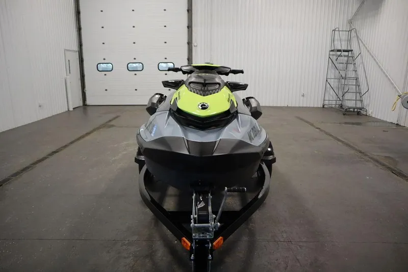 Slide: The Image of 2022 Sea-Doo GTI SE 170 SS jet ski in a garage, front view. - 25