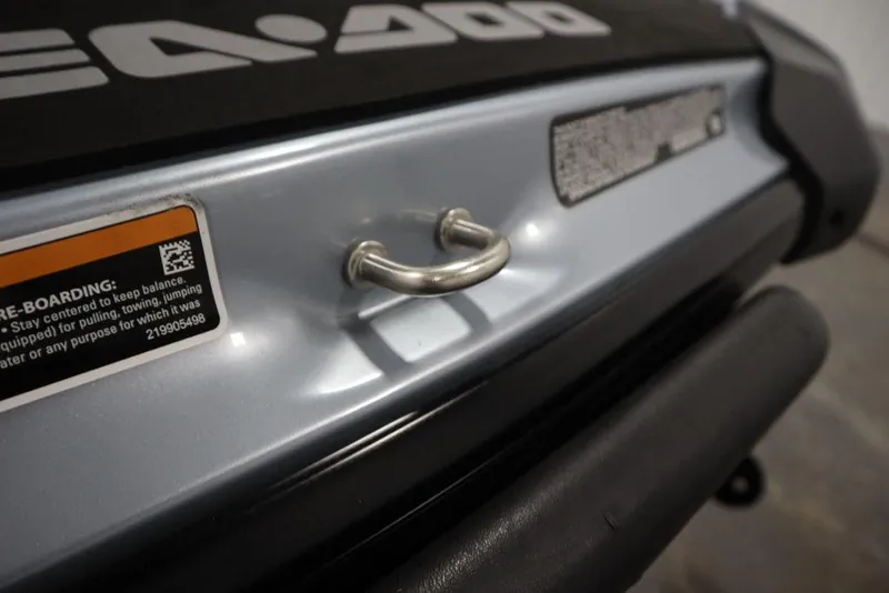 Slide: The Image of 2022 Sea-Doo GTI SE 170 SS rear view with handle and safety labels. - 4