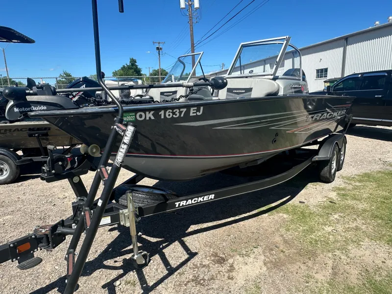 Slide: The Image of 2018 Tracker Targa V-19 WT 40th Anniversary Edition boat on trailer, parked outdoors. - 15
