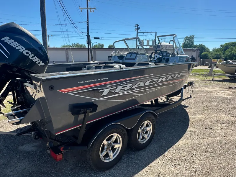 Slide: The Image of 2018 Tracker Targa V-19 WT 40th Anniversary Edition boat on trailer, side view. - 3