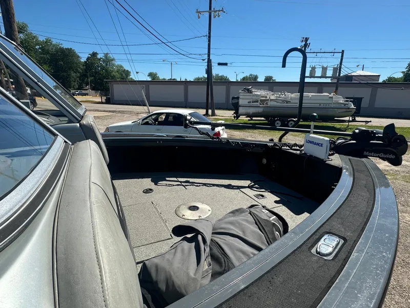 Slide: The Image of 2018 Tracker Targa V-19 WT 40th Anniversary Edition boat interior with fishing gear. - 7