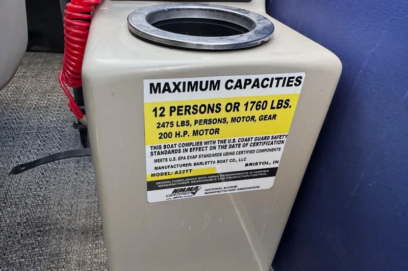 Slide: The Image of 2023 Barletta ARIA 22QC capacity label: 12 persons, 1760 lbs, 200 HP motor. - 49