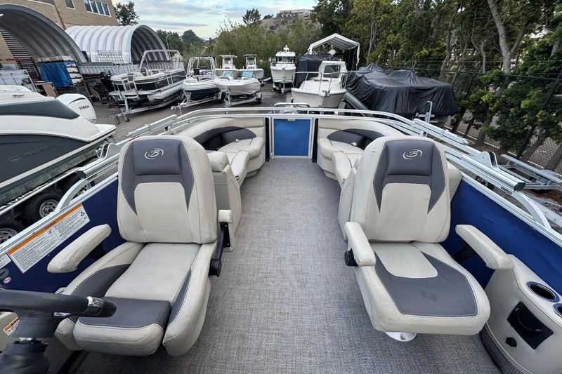Slide: The Image of 2023 Barletta ARIA 22QC pontoon boat interior with plush seating and modern design. - 51