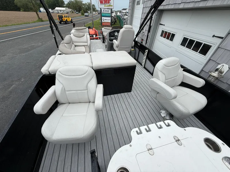 Slide: The Image of 2020 Avalon 2585 Catalina Tri-toon boat with plush seating and high-performance features. - 10
